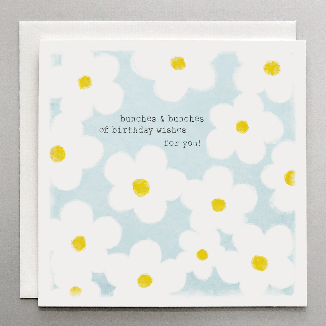 Floral birthday wishes card with wildflower bunches on cotton textured paper